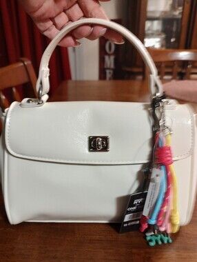 White Top-Handle Women’s Bag with Colorful Tassel